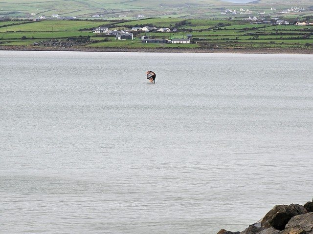 No waves and minimal wind but a wing foiler is trying their best